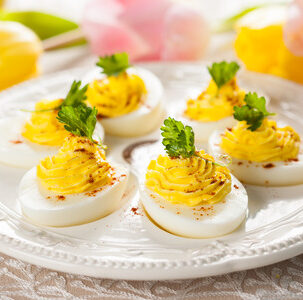 25841736 - deviled eggs with paprika for easter